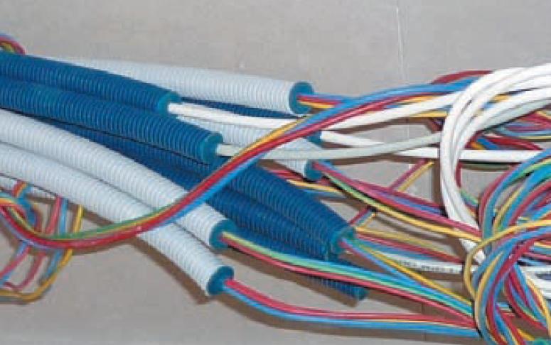 Lorsque le tableau électrique est hors volume chauffé, un bouchon étanche doit être placé entre câble et fourreau afin d’éviter les entrées d’air